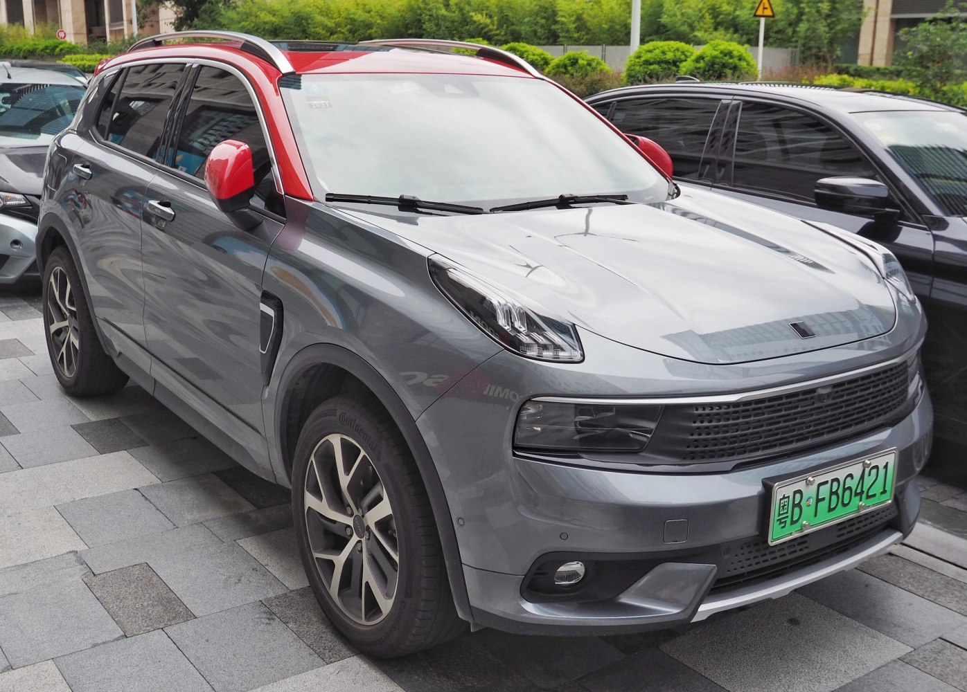 Crossover SUV with two-tone roof and modern LED headlights