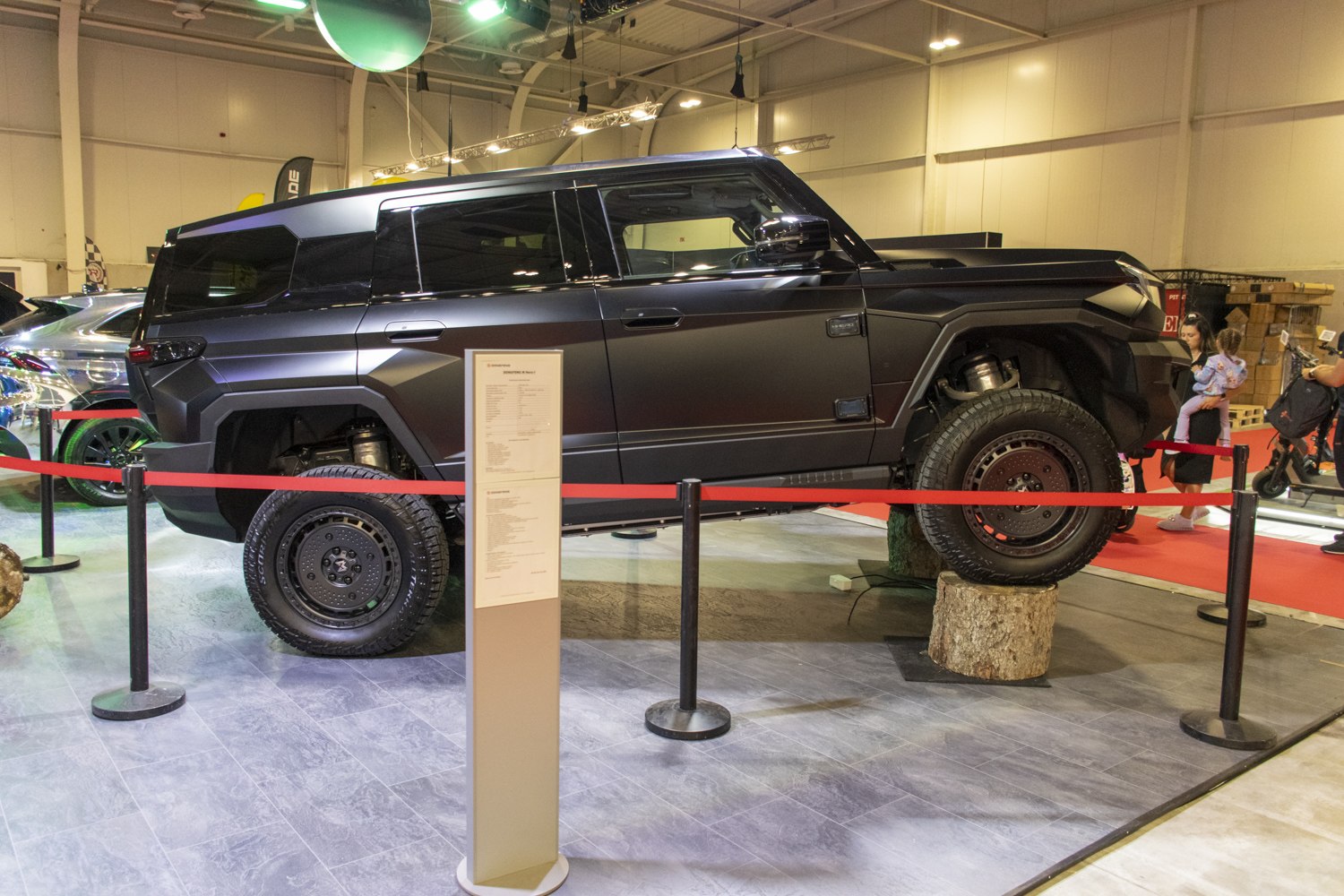 Angular SUV with elevated suspension and off-road wheels