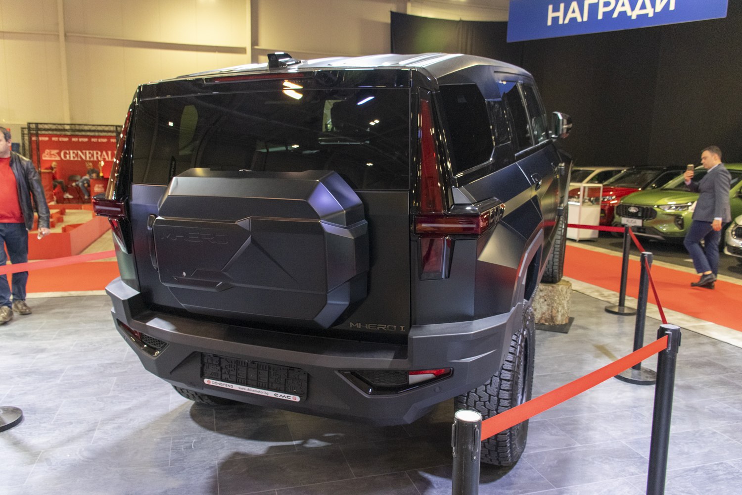 Rugged SUV rear with spare tire cover and bold tail lights