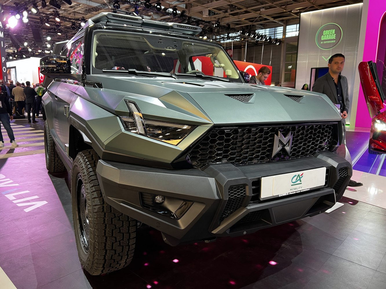 Angular SUV front with LED headlights and honeycomb grille