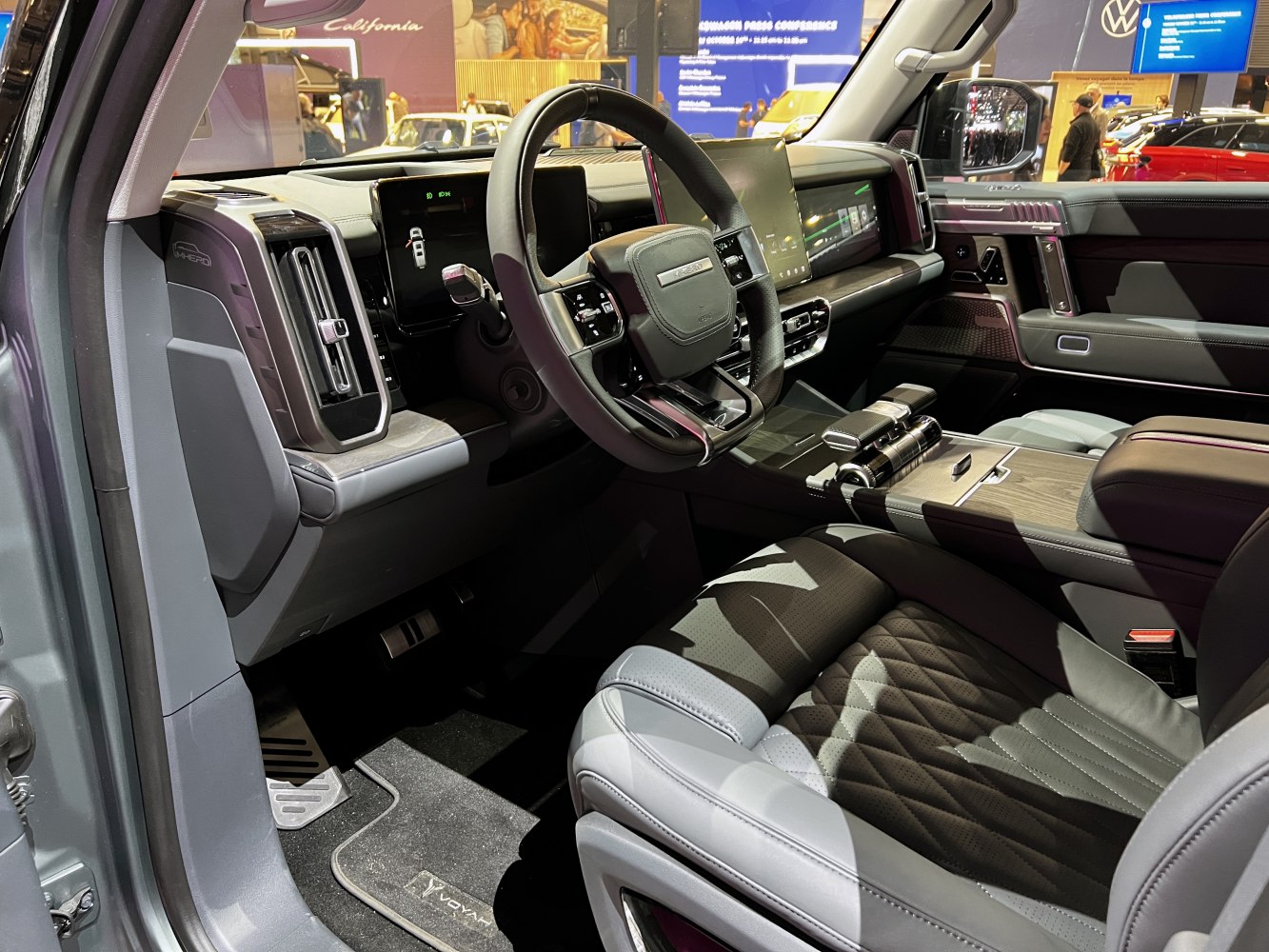 Digital dashboard, touchscreen, and luxury leather seating in modern car interior