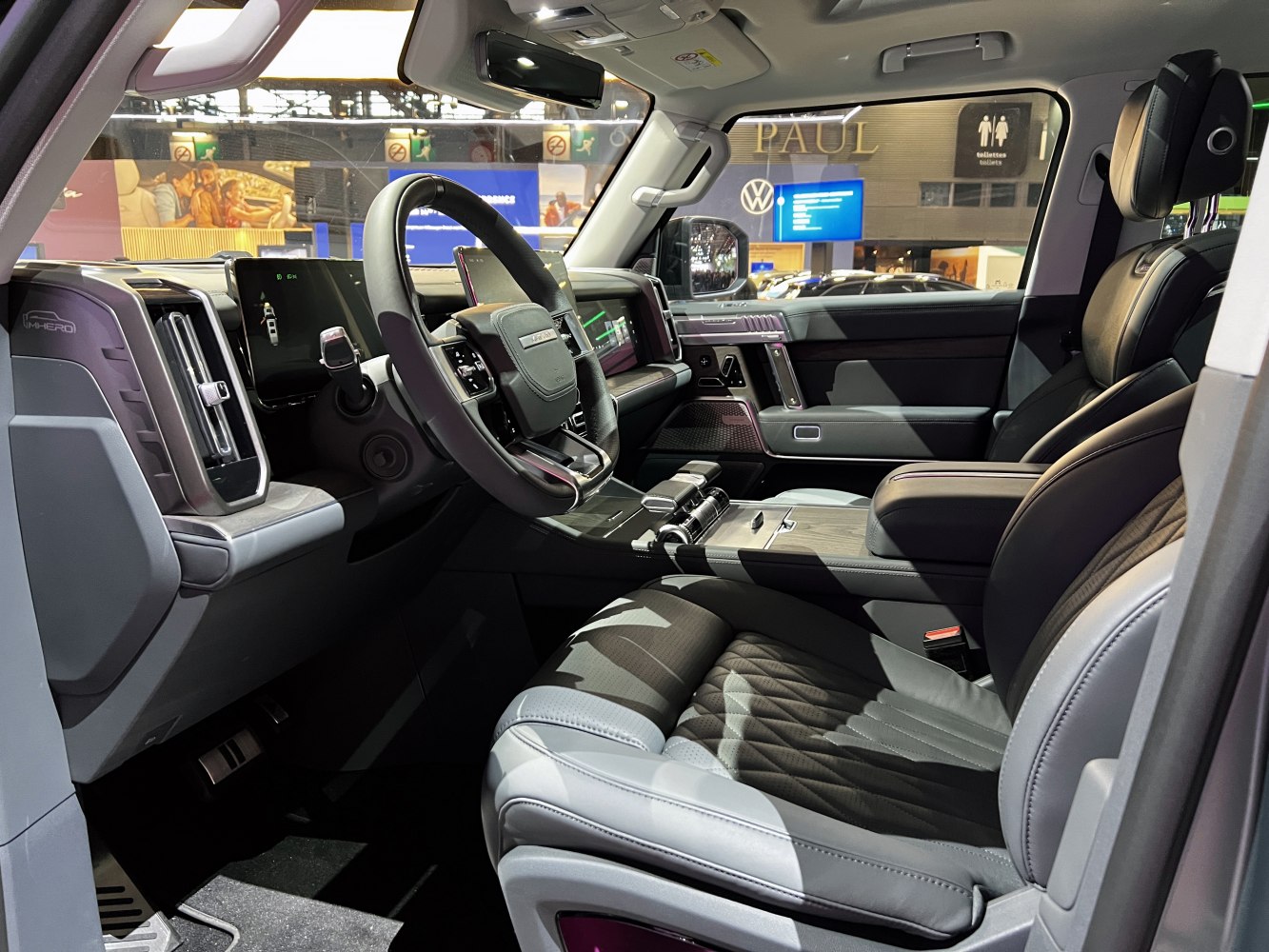 Modern interior with digital dashboard and premium front seats