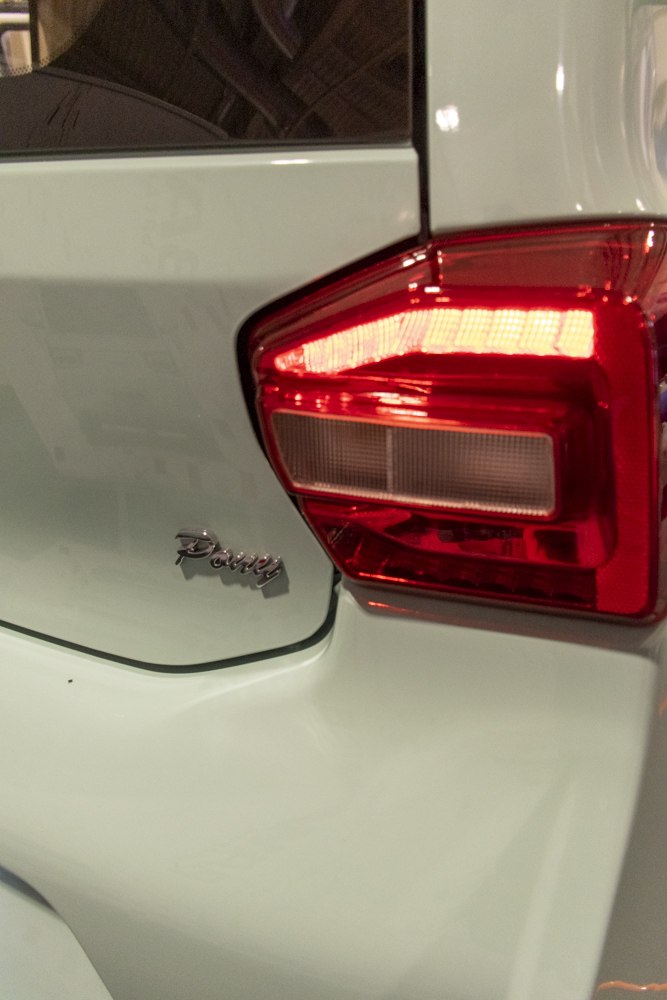 Close-up of rear red tail light and Pony model badge