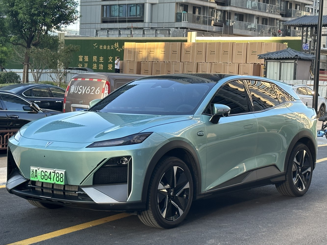 Sleek front and side view of modern electric SUV with aerodynamic design