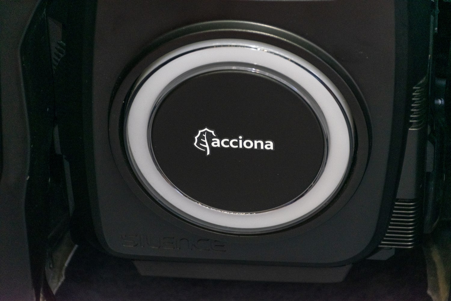 Close-up of an Acciona wireless charging pad integrated in an electric vehicle.