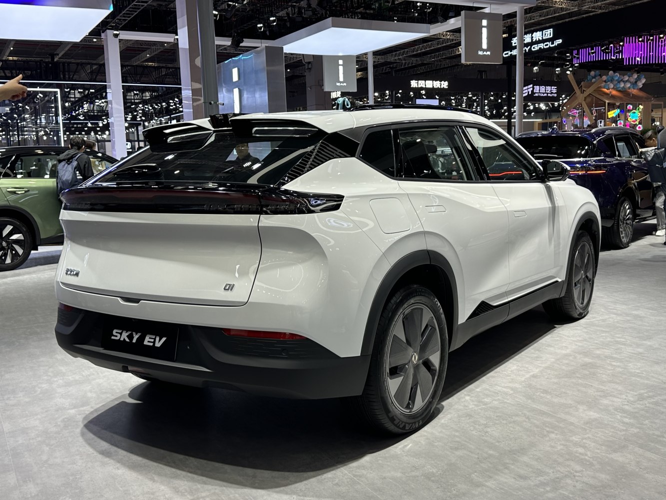 Rear view of electric SUV with integrated spoiler and LED light bar