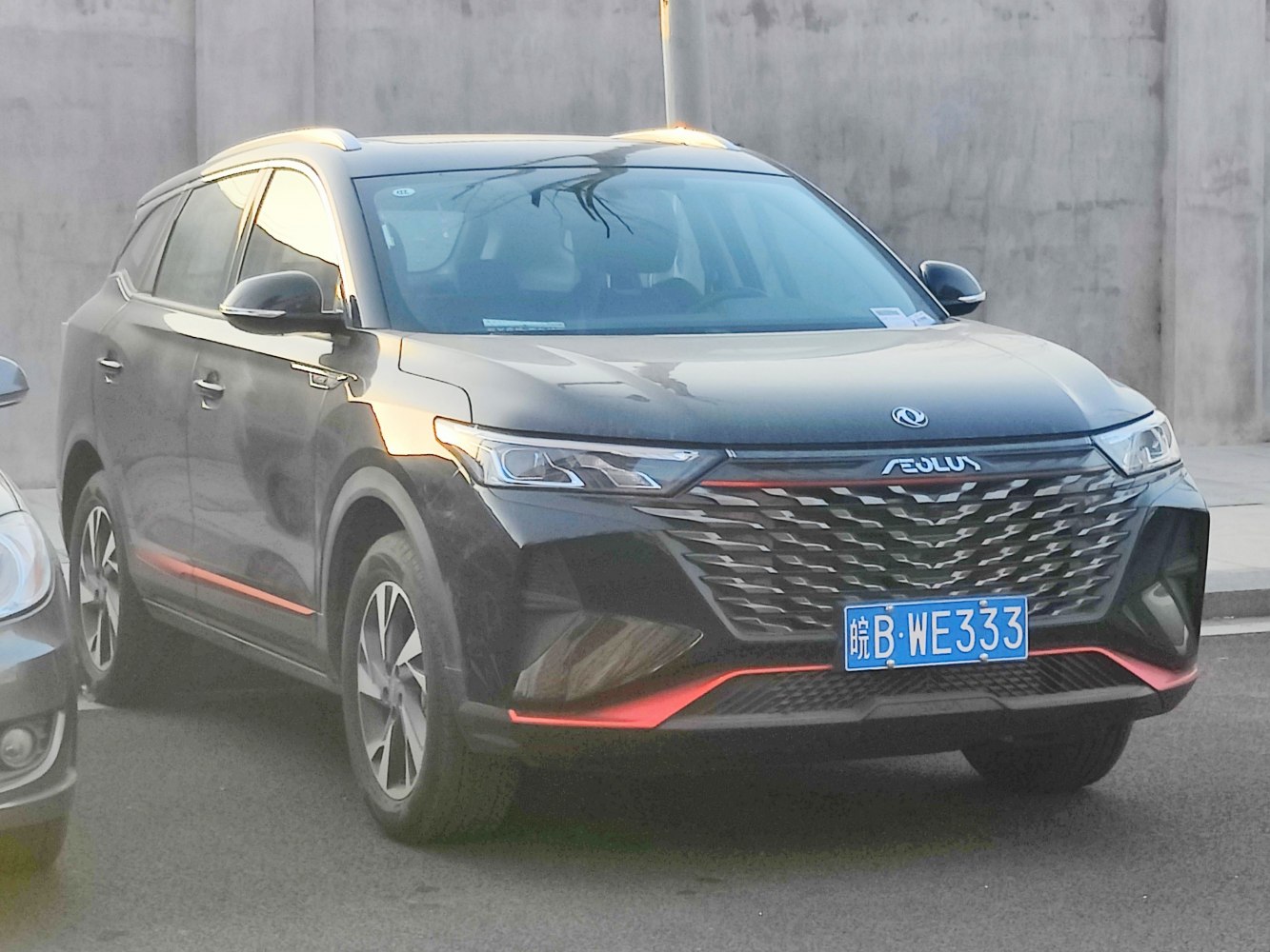 Aggressive front grille and modern SUV styling with LED headlights.