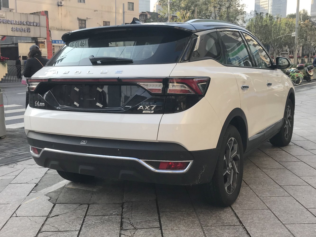 Rear view of white SUV with unique taillights and rear bumper
