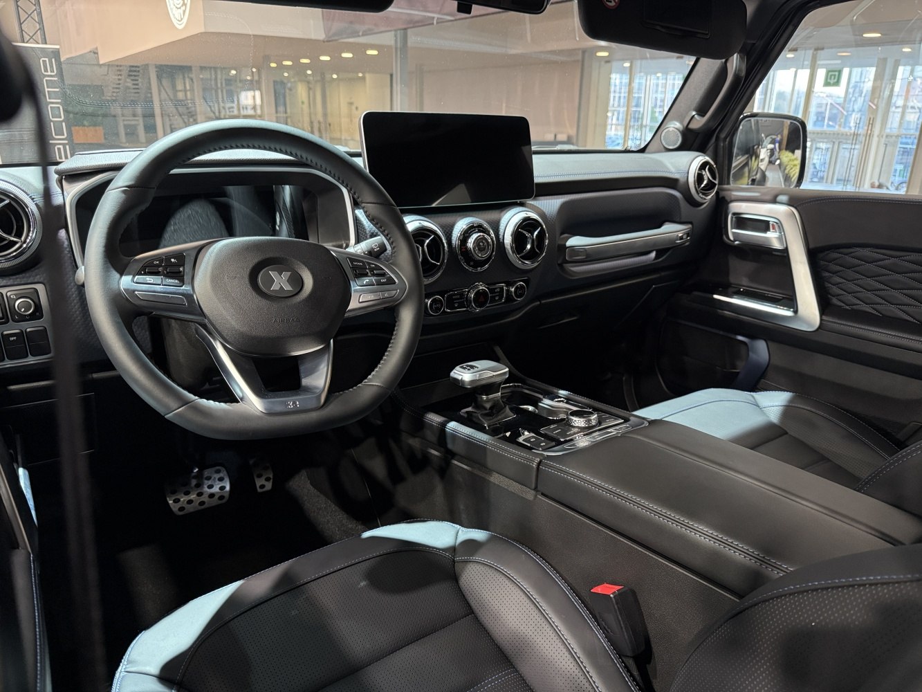 Modern car interior with digital dashboard and touchscreen display