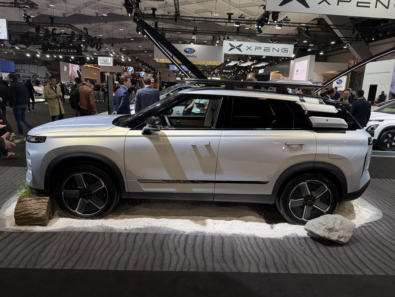 Modern SUV with futuristic side mirrors and large five-spoke alloy wheels