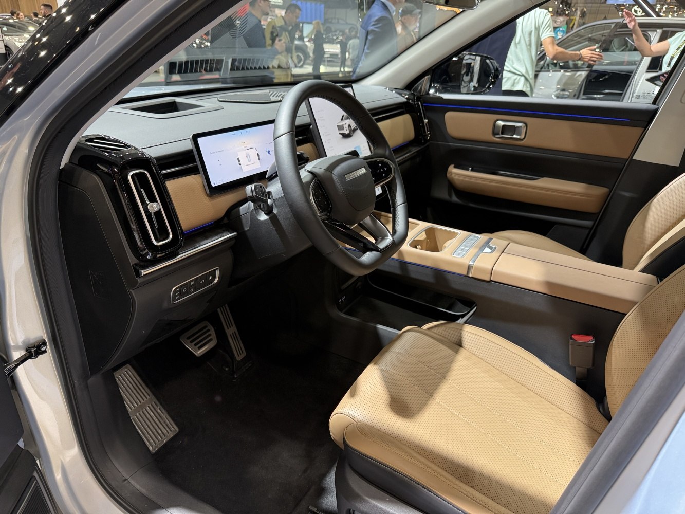 Dual digital dashboard and premium tan leather seats interior