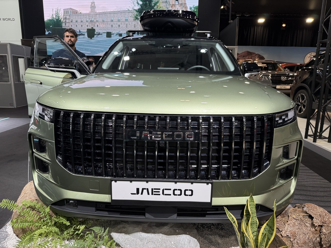 Bold vertical front grille and slim LED headlights