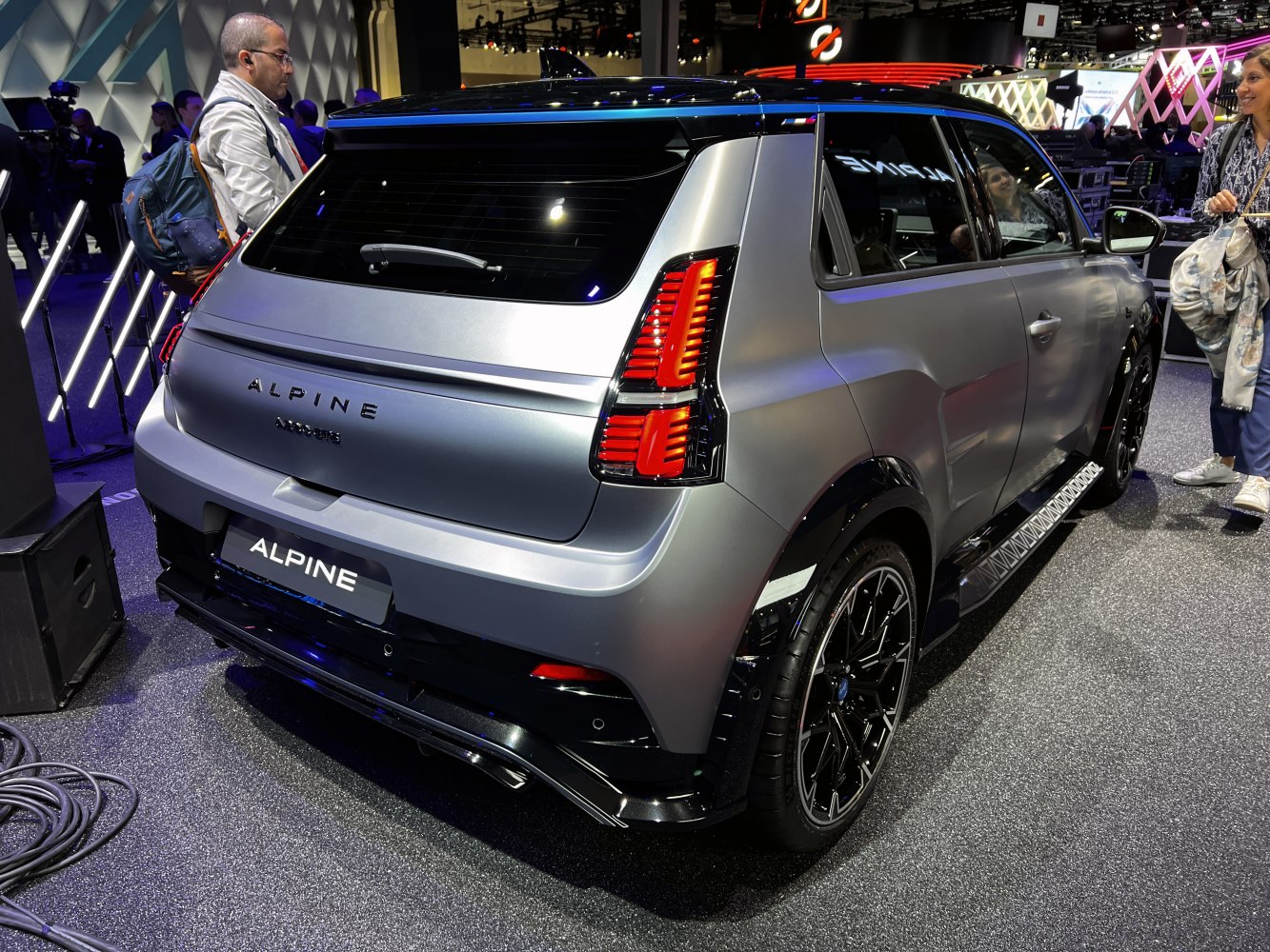 Rear and side profile with distinctive vertical taillights and black alloy wheels