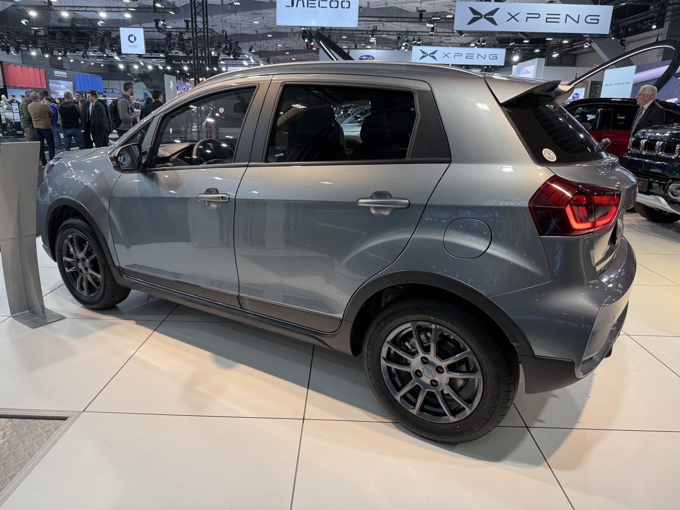 Side profile of a compact SUV with alloy wheels and visible door handles