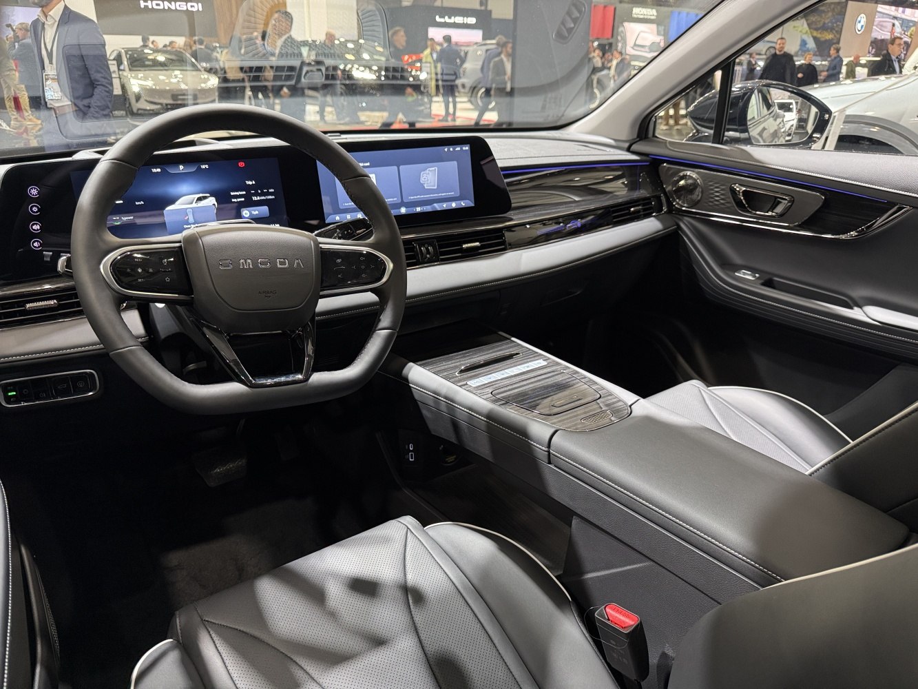 Digital dashboard and modern steering wheel with luxury interior details