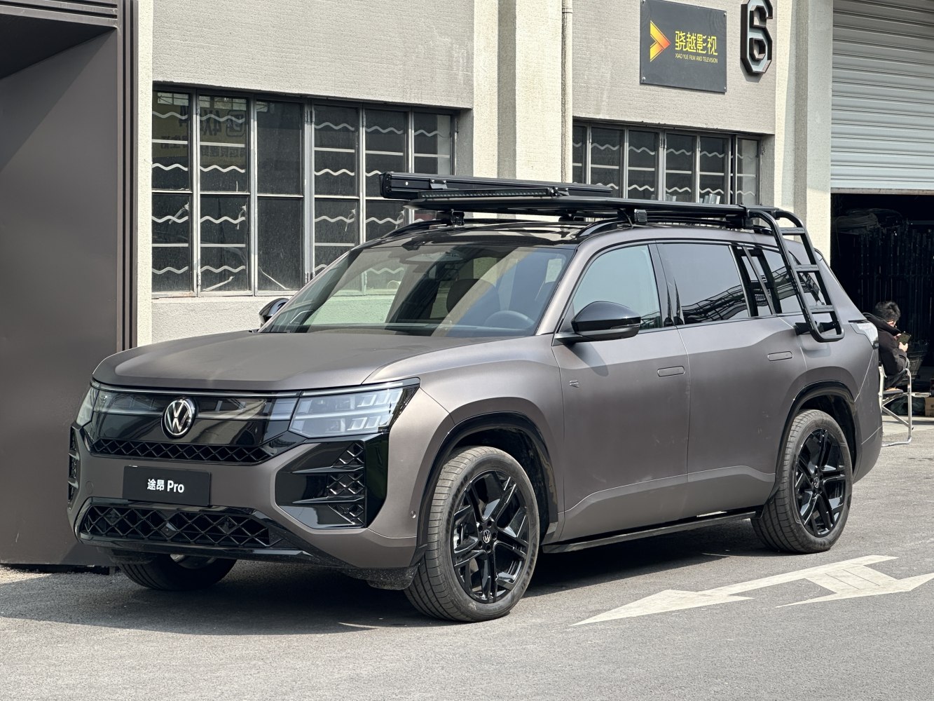 SUV with roof rack and black alloy wheels