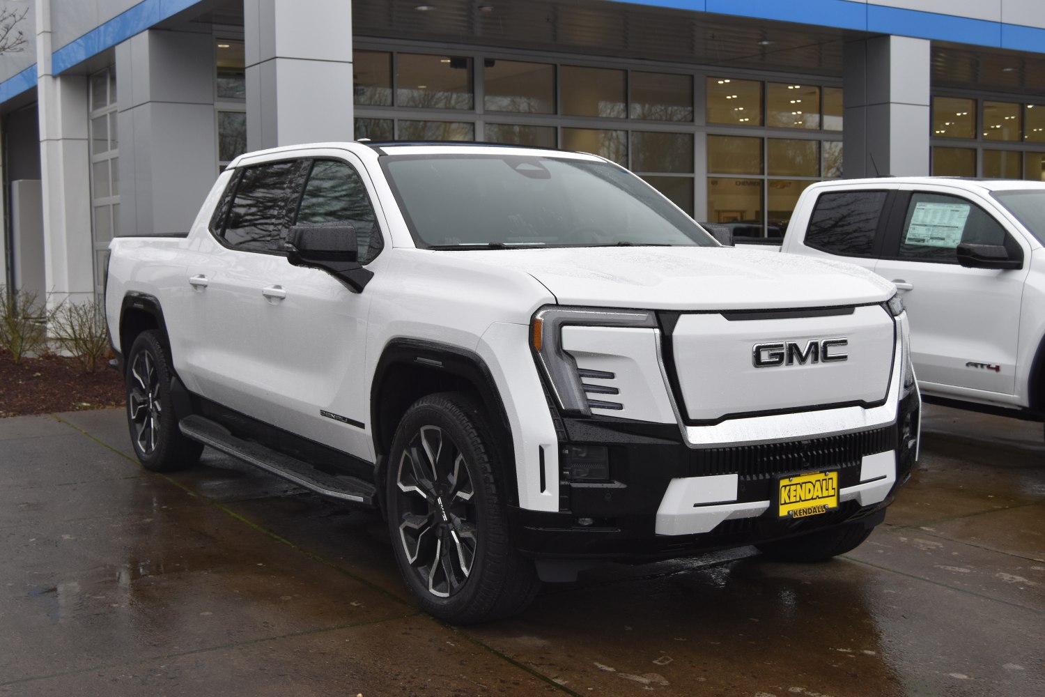 Electric pickup truck with crew cab, modern grille and LED headlights
