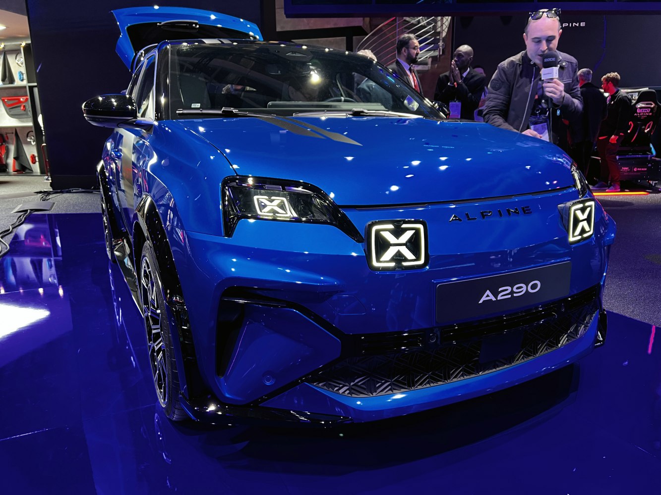 Front view with unique square LED headlights and bold blue paint