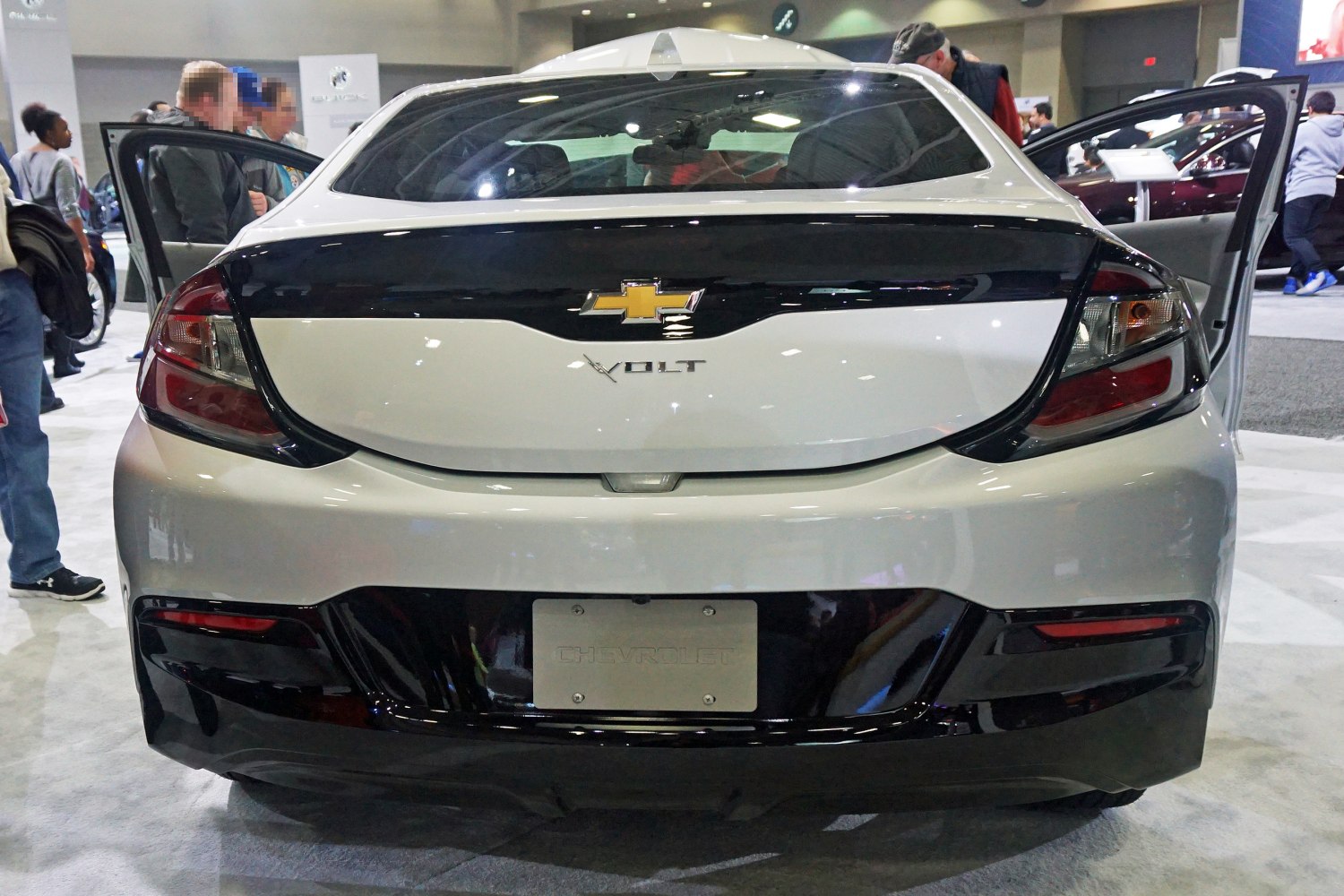 Rear view with distinct tail lights and compact hatchback design