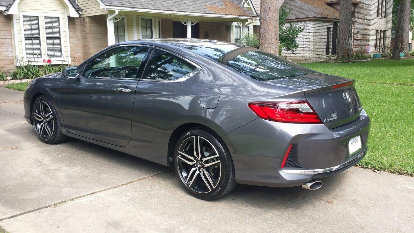 Rear side profile with alloy wheels and modern sporty design