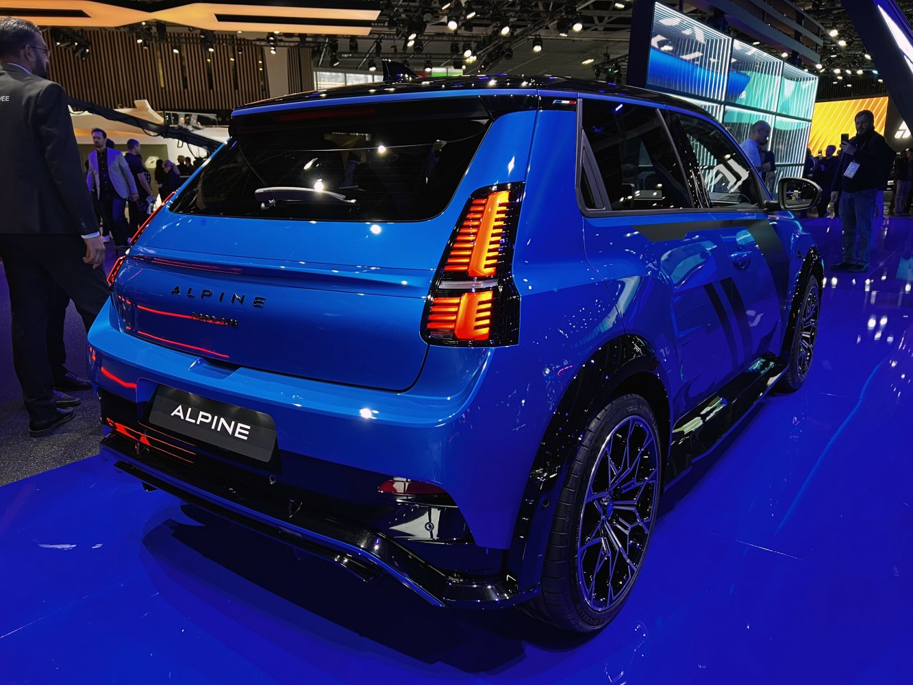 Rear view of a sporty hatchback with distinctive LED taillights and glossy black detailing