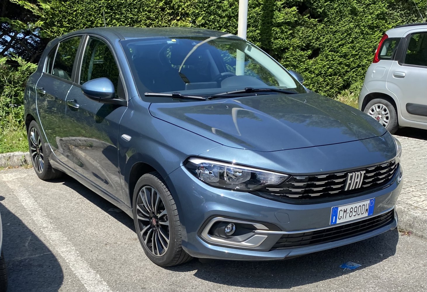 Sporty hatchback front with LED headlights and distinctive grille