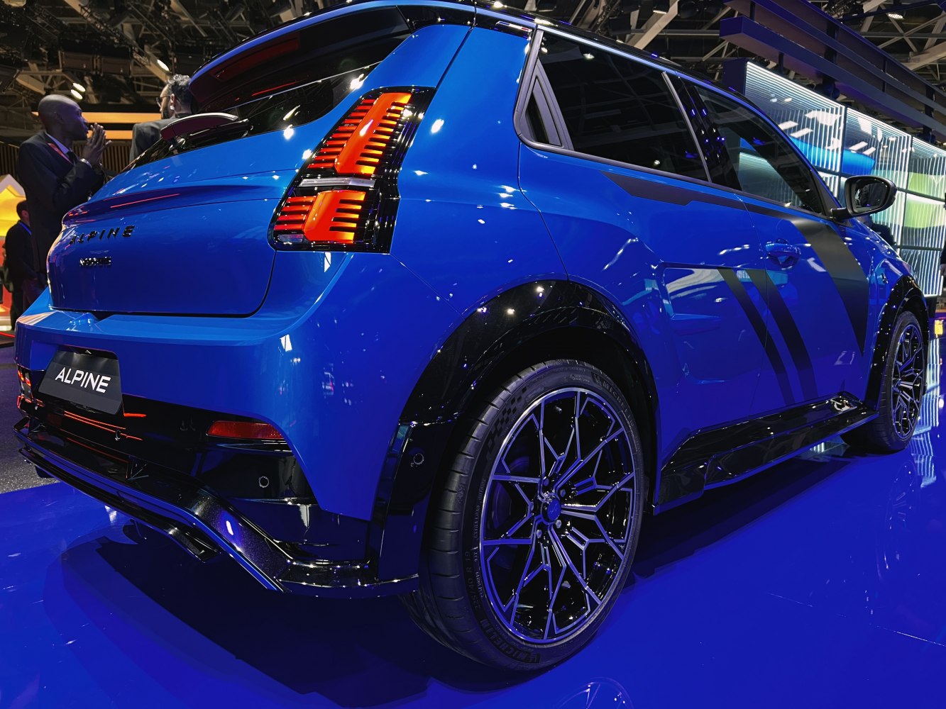 Sleek car rear design with distinctive sporty alloy wheels and LED taillights