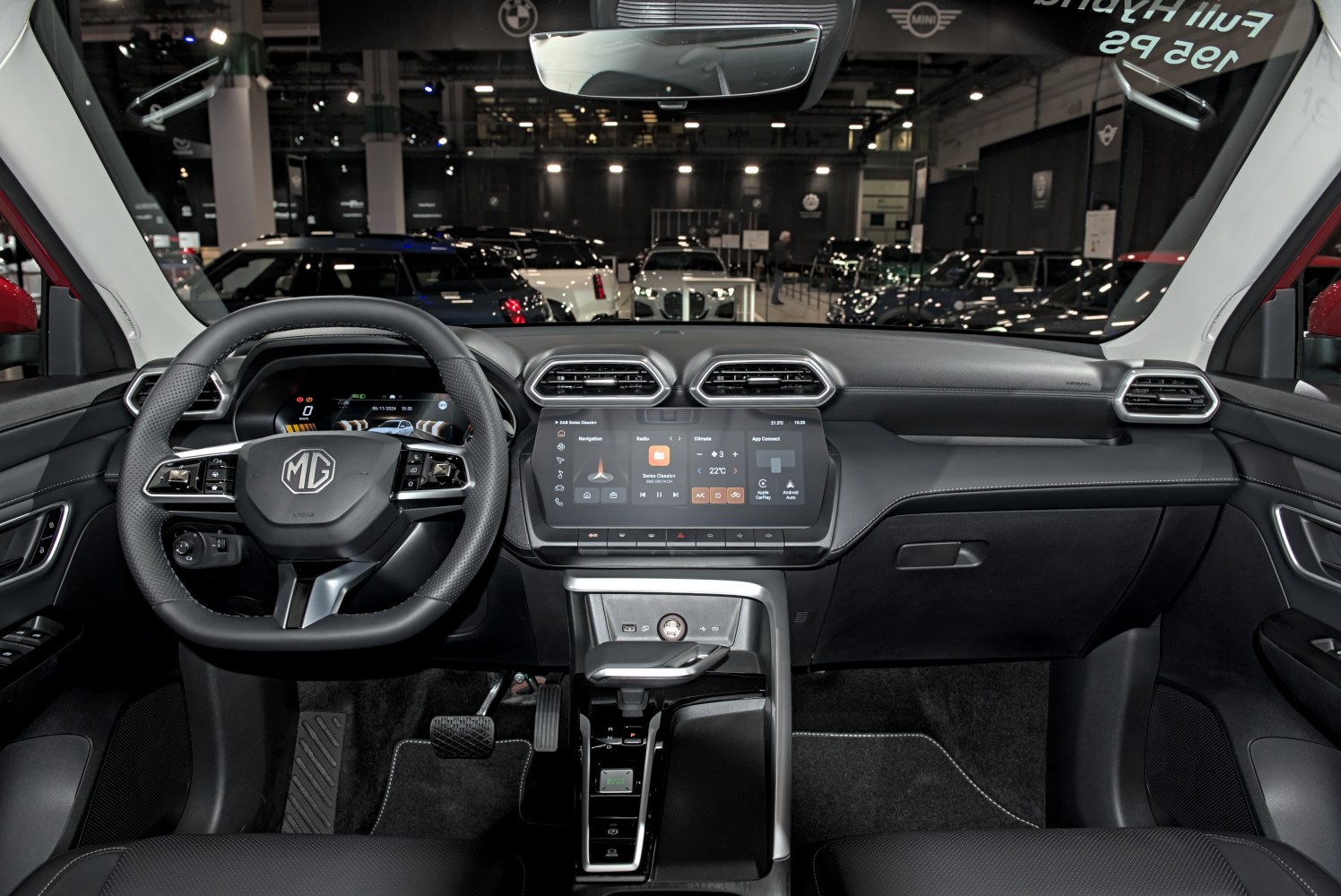 Digital dashboard and multifunctional steering wheel in car interior