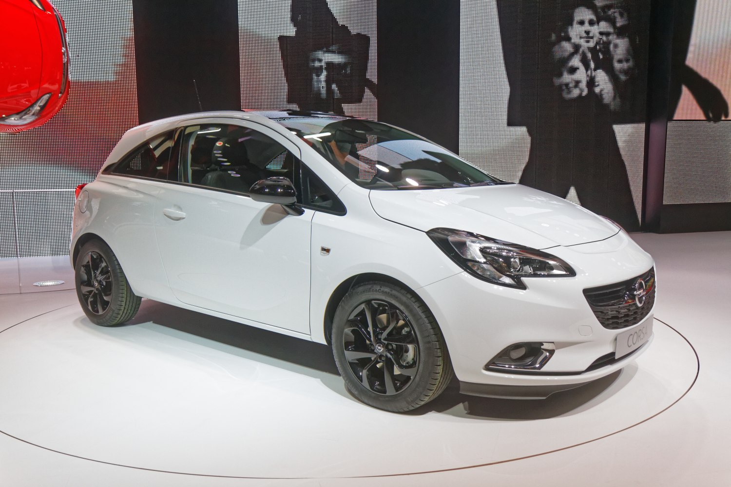 White 3-door hatchback with black alloy wheels
