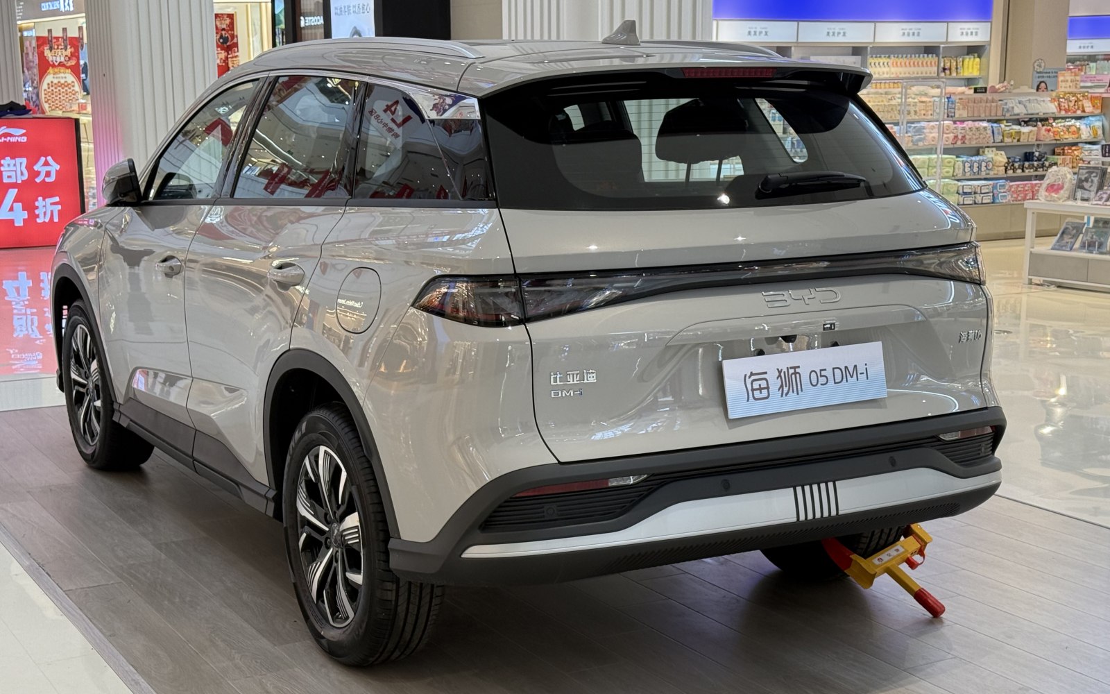 Rear view of a modern SUV with sleek tail lights and alloy wheels