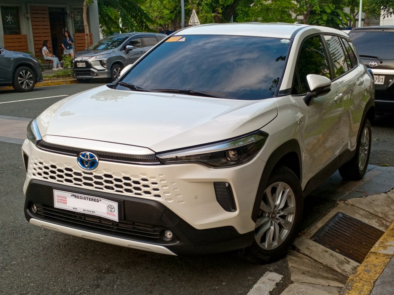 Front and side view of updated SUV with distinctive grille and headlights