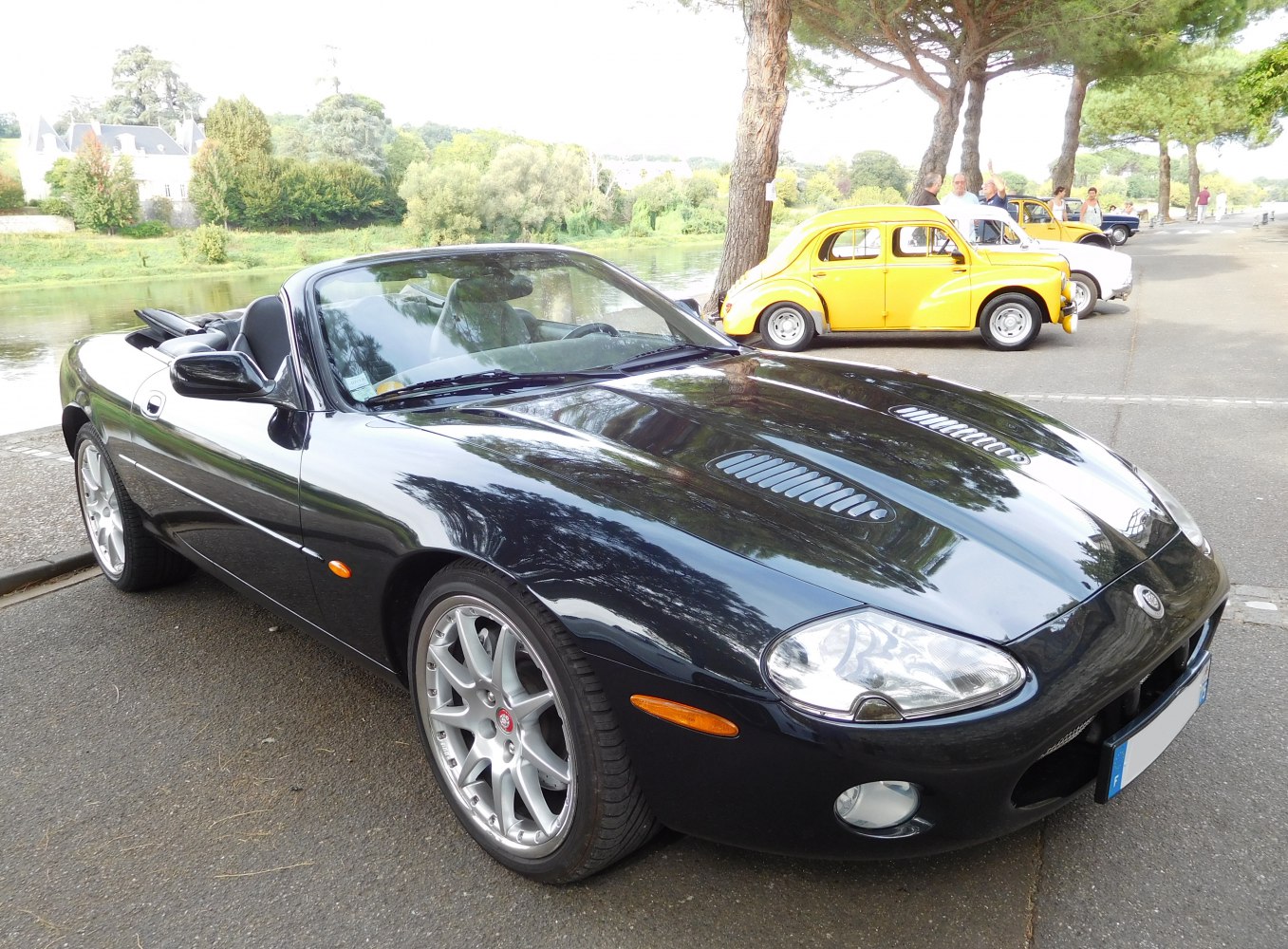 Convertible sports car with vented hood and alloy wheels
