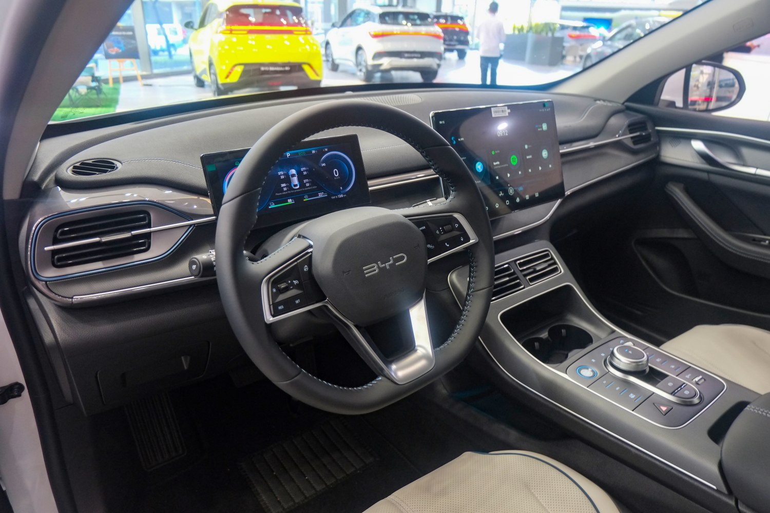 Digital dashboard and large infotainment touchscreen in car interior
