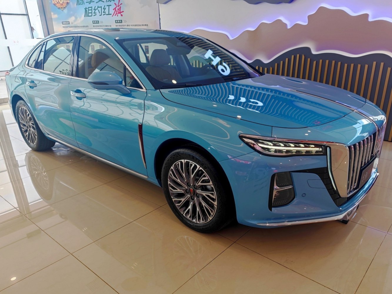 Luxury sedan with vertical grille and LED headlights