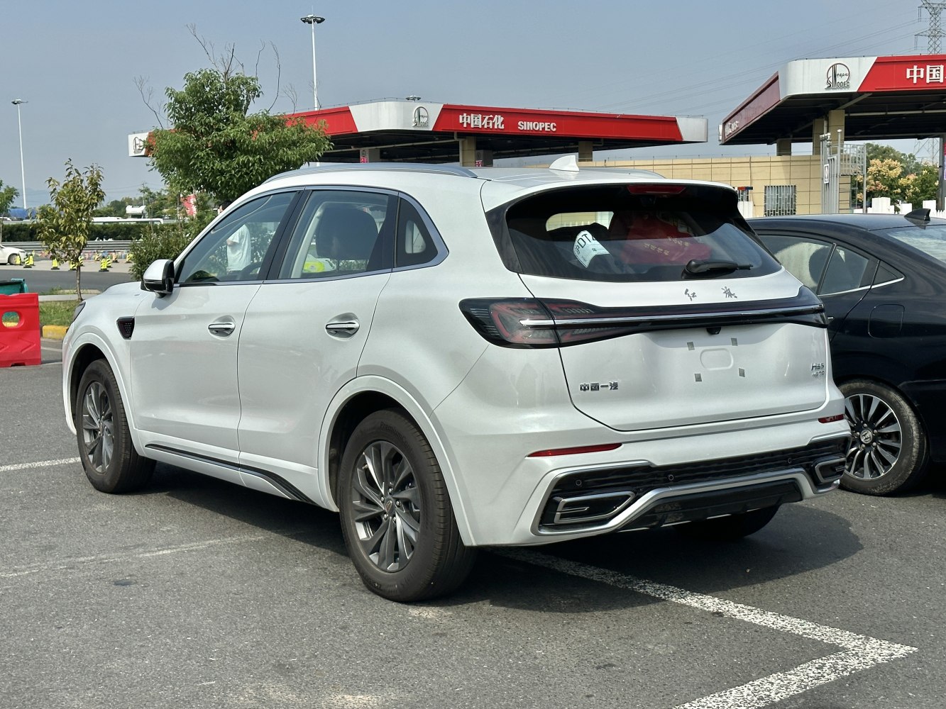 SUV rear and side view with modern tail lights and sporty diffuser