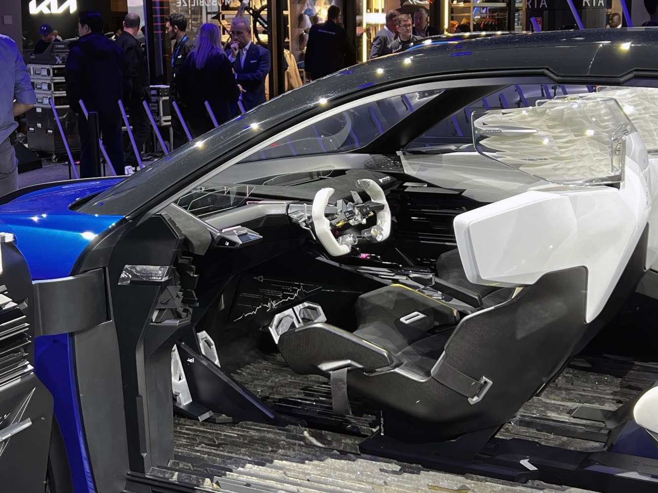 Futuristic car interior with advanced seat and steering design