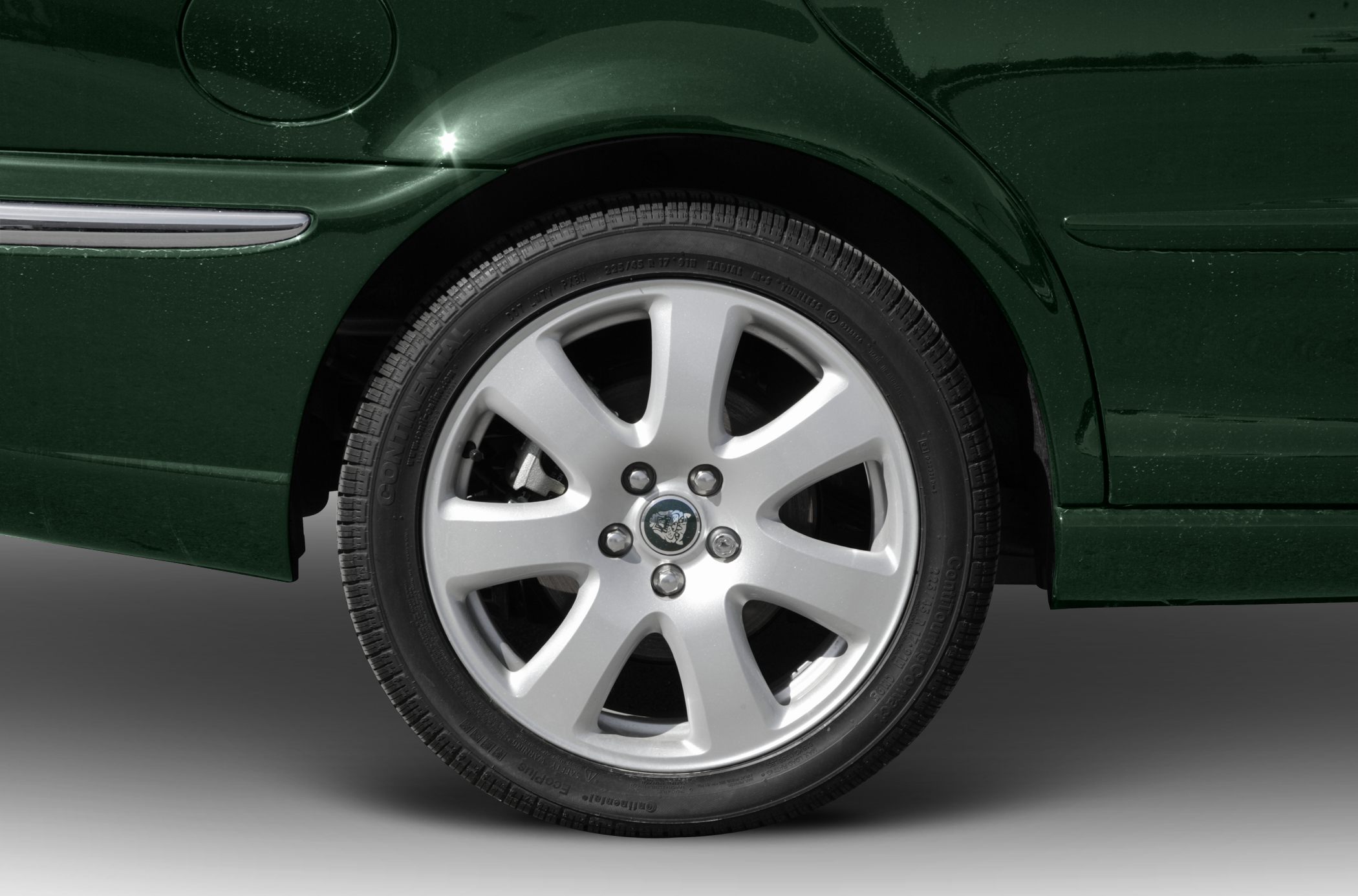 Alloy wheel and tire close-up with rear fender detail