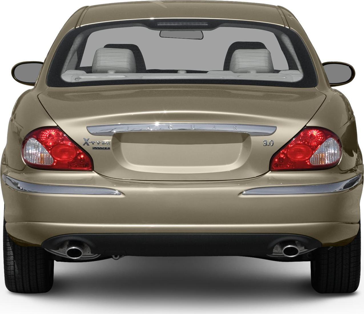 Rear view with distinctive taillights and dual exhaust pipes