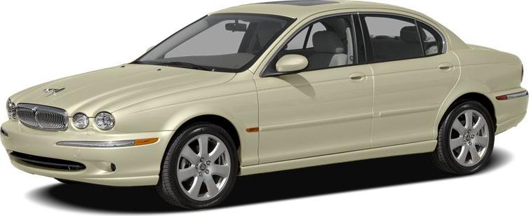 Sedan exterior front side view with alloy wheels and cream paint