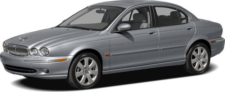 Silver four-door luxury sedan with sleek exterior and alloy wheels