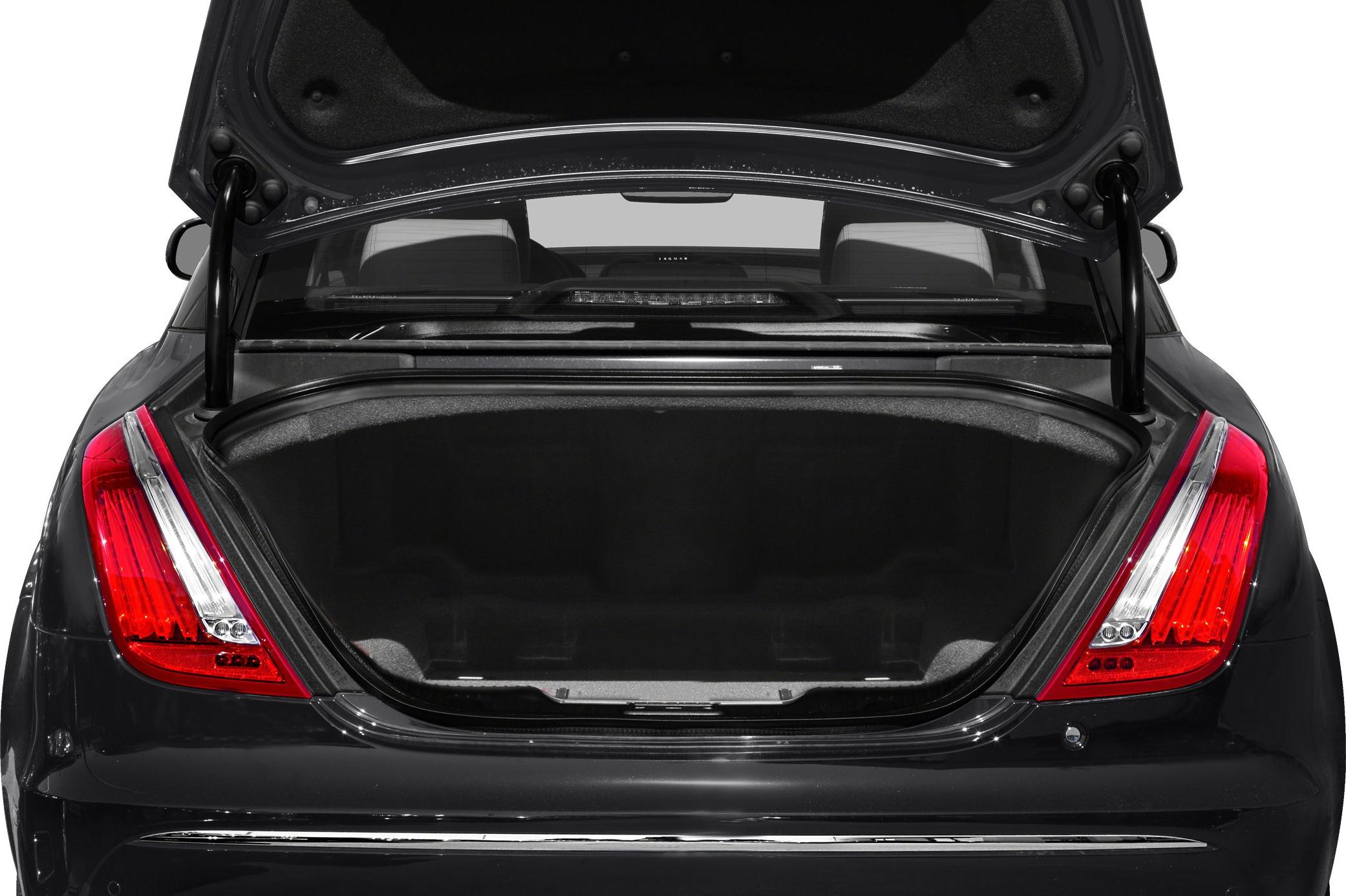 Open trunk with vertical tail lights on a luxury sedan rear
