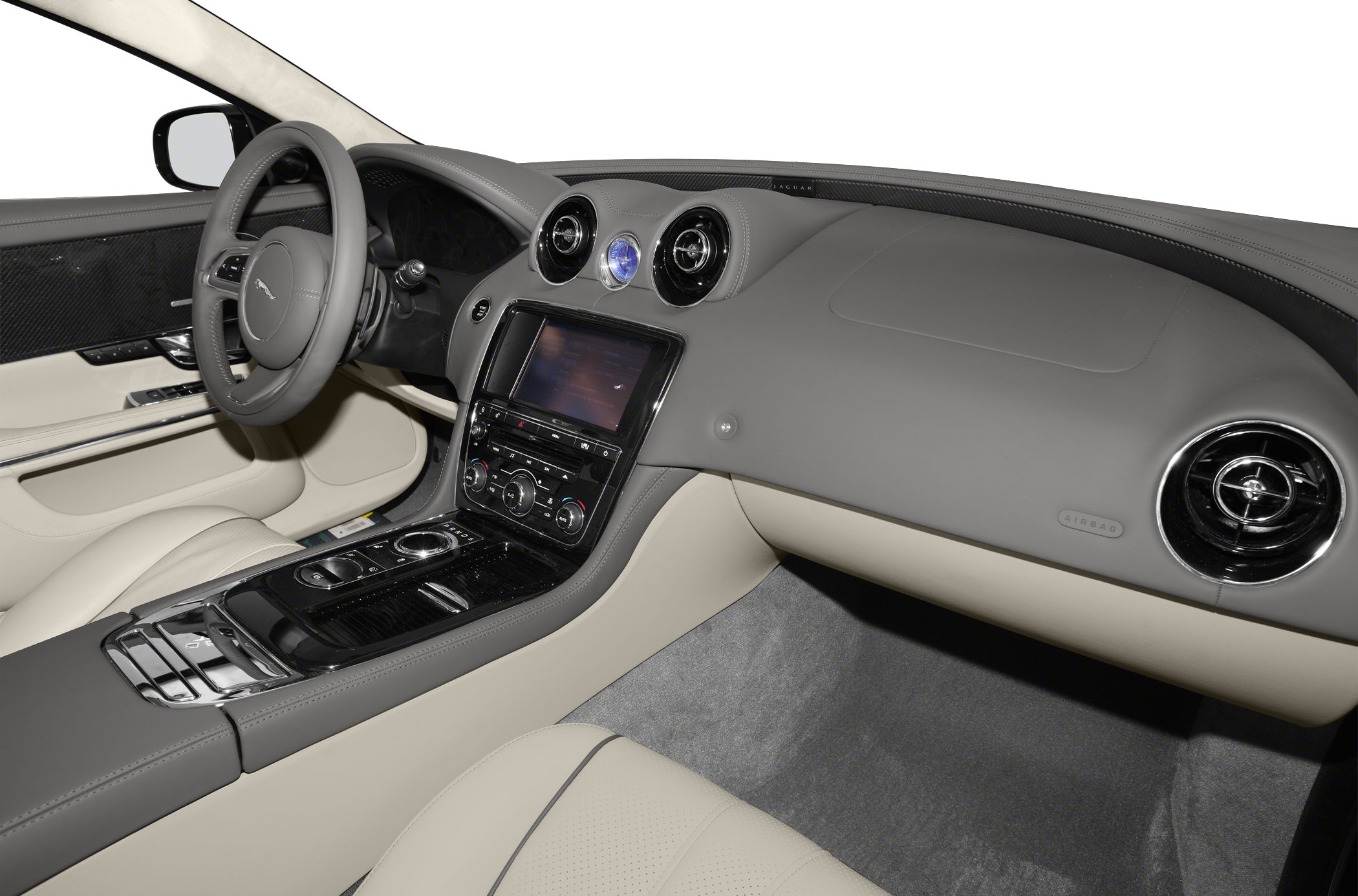 Luxury car interior with dashboard, steering wheel, and central console