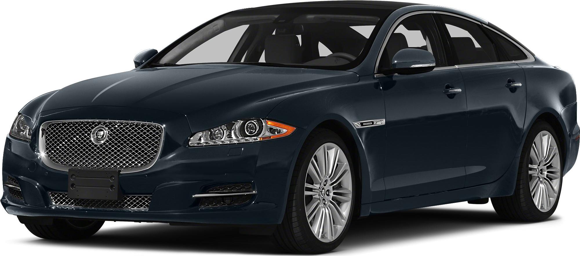 Luxury sedan front-side with mesh grille and alloy wheels