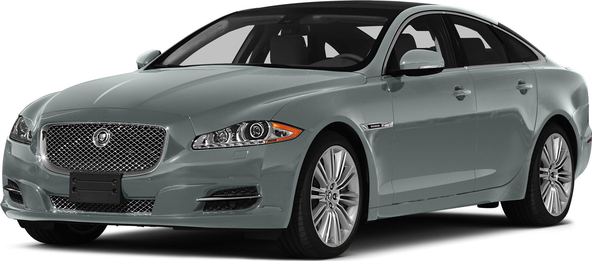 Luxury sedan with chrome mesh grille and sleek projector headlights.