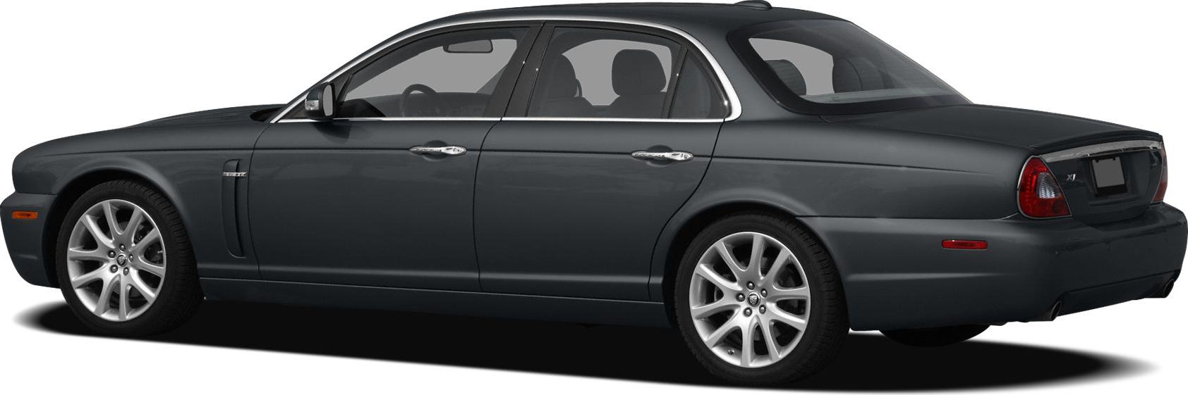 Side profile of luxury sedan with sleek body and distinctive rims