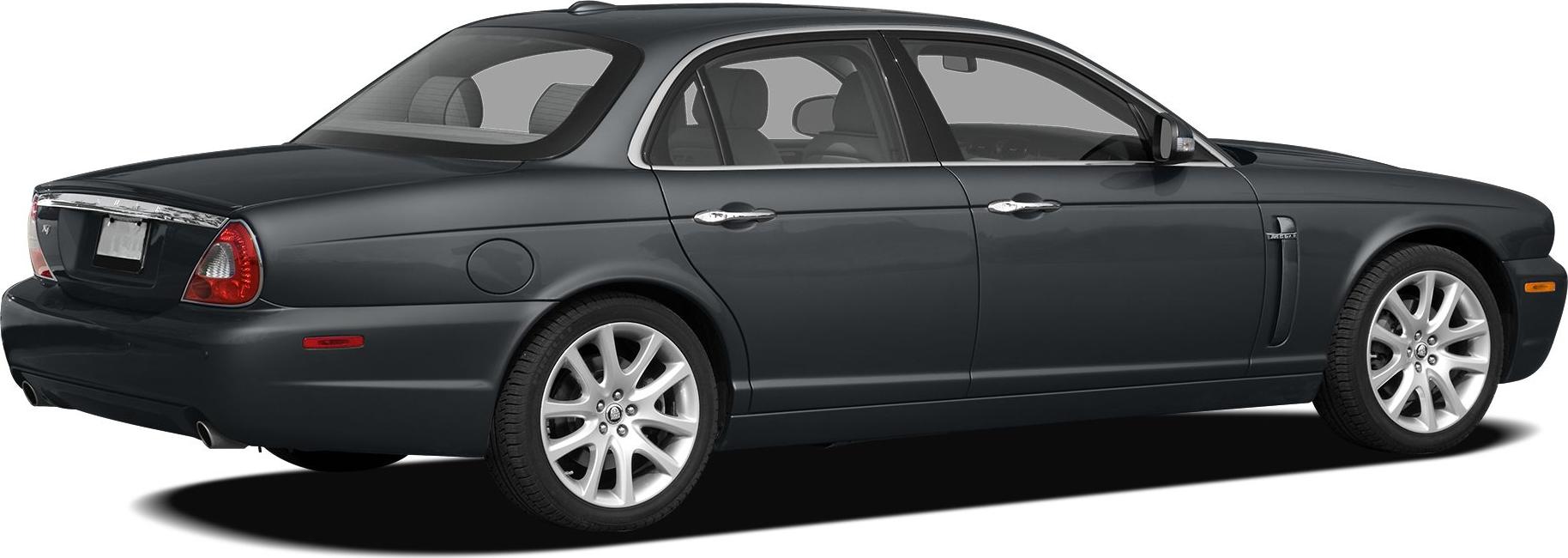Rear side view of luxury sedan with alloy wheels