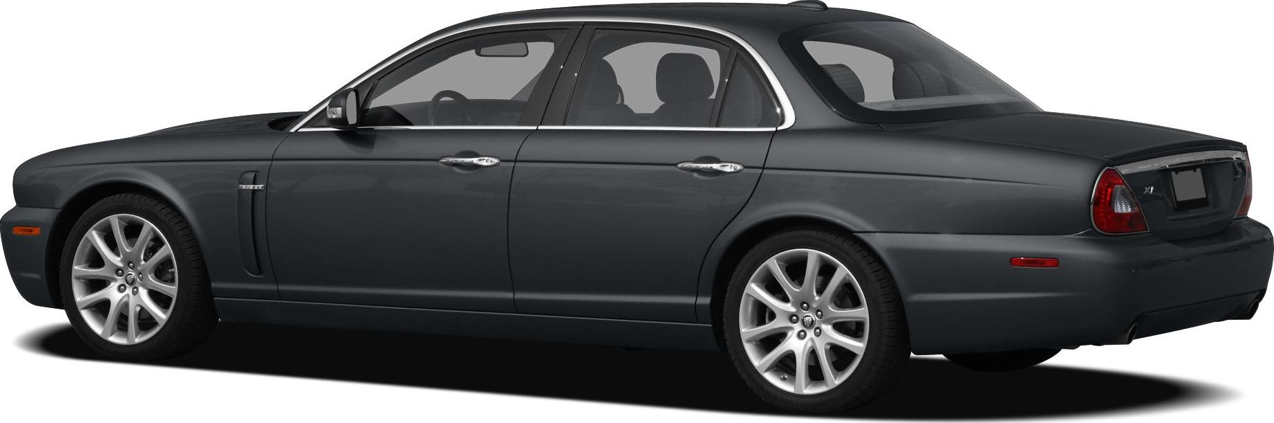 Luxury sedan rear side view with alloy wheels and tinted windows