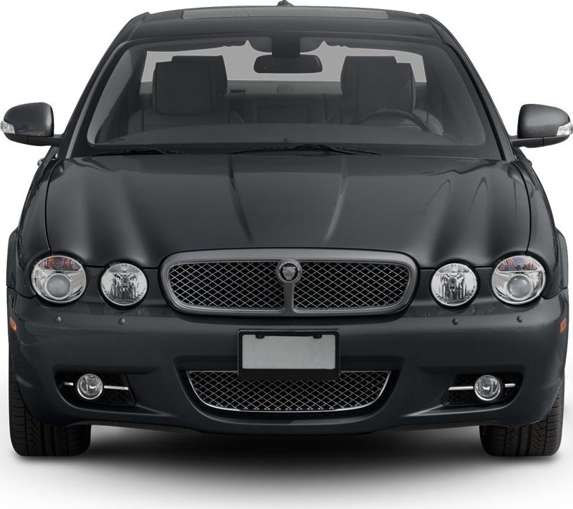 Front view with dual round headlights and mesh grille
