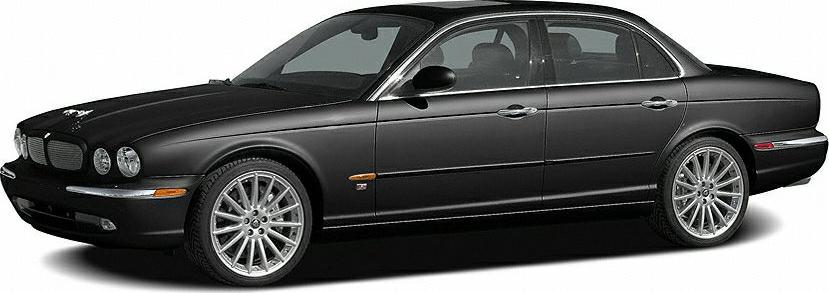 Sleek black luxury sedan with iconic front grille and alloy wheels