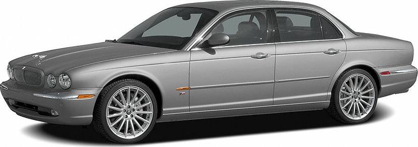 Silver luxury sedan with sleek body and alloy wheels in front-side view